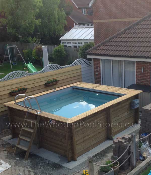 urban wooden pool with electric cover - the wooden pool store